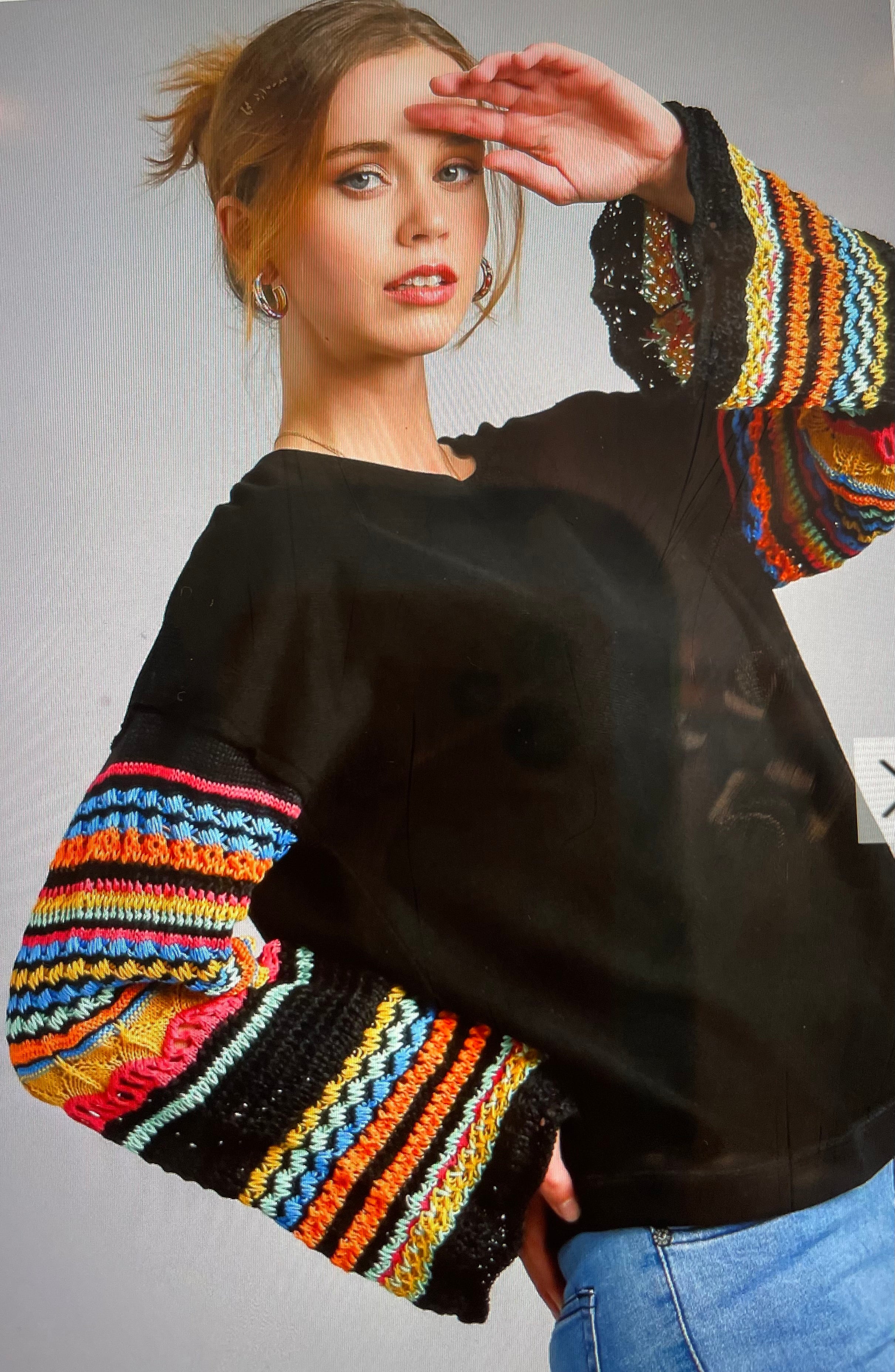 Sweater with crochet sleeve