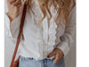 white eyelet cotton blouse
